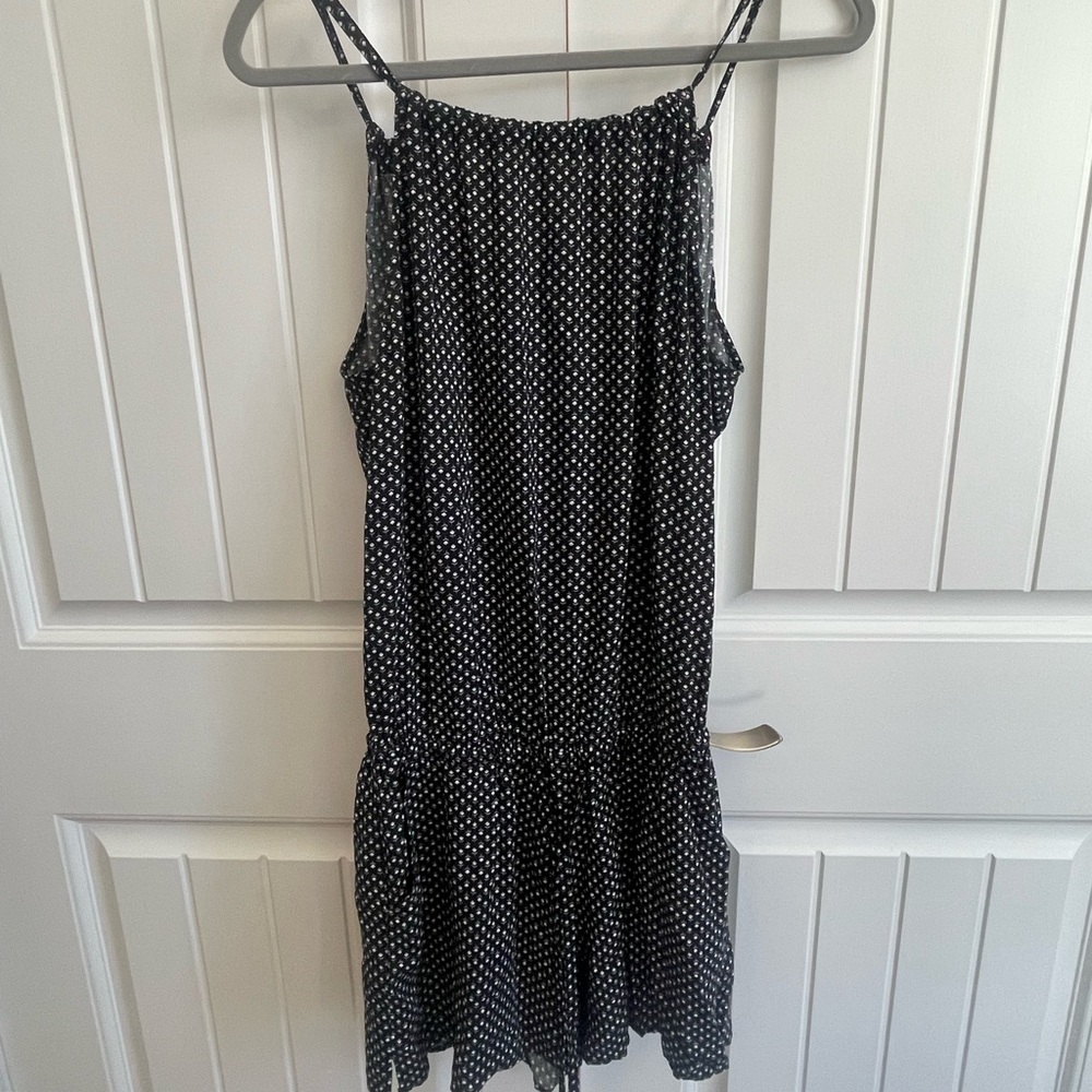 Old Navy black w/ white floral pattern romper, size small, lightly warn